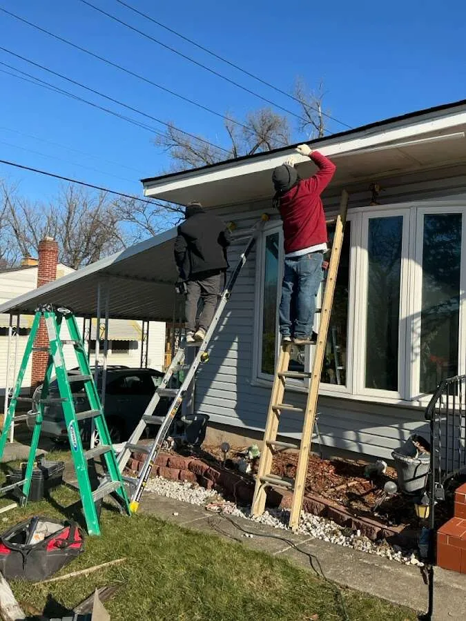 Restoration crew performing exterior repair in The Acreage