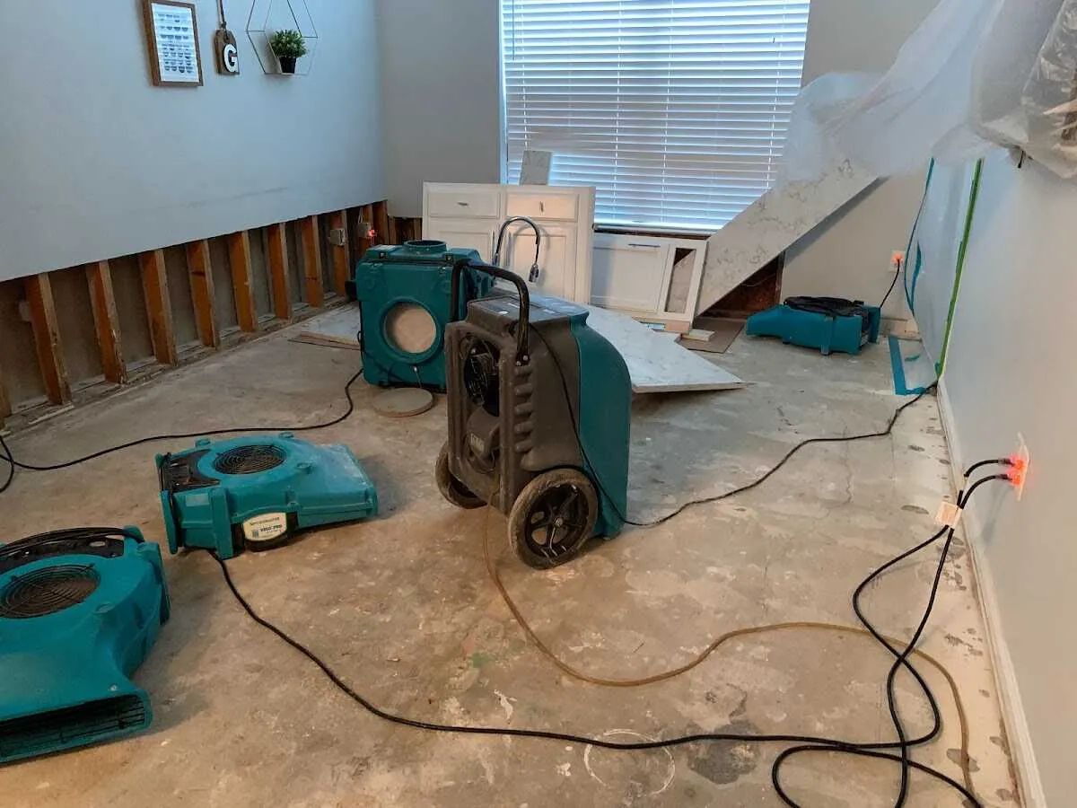 Dehumidifier in flood-cut room for Water Damage Restoration in The Acreage